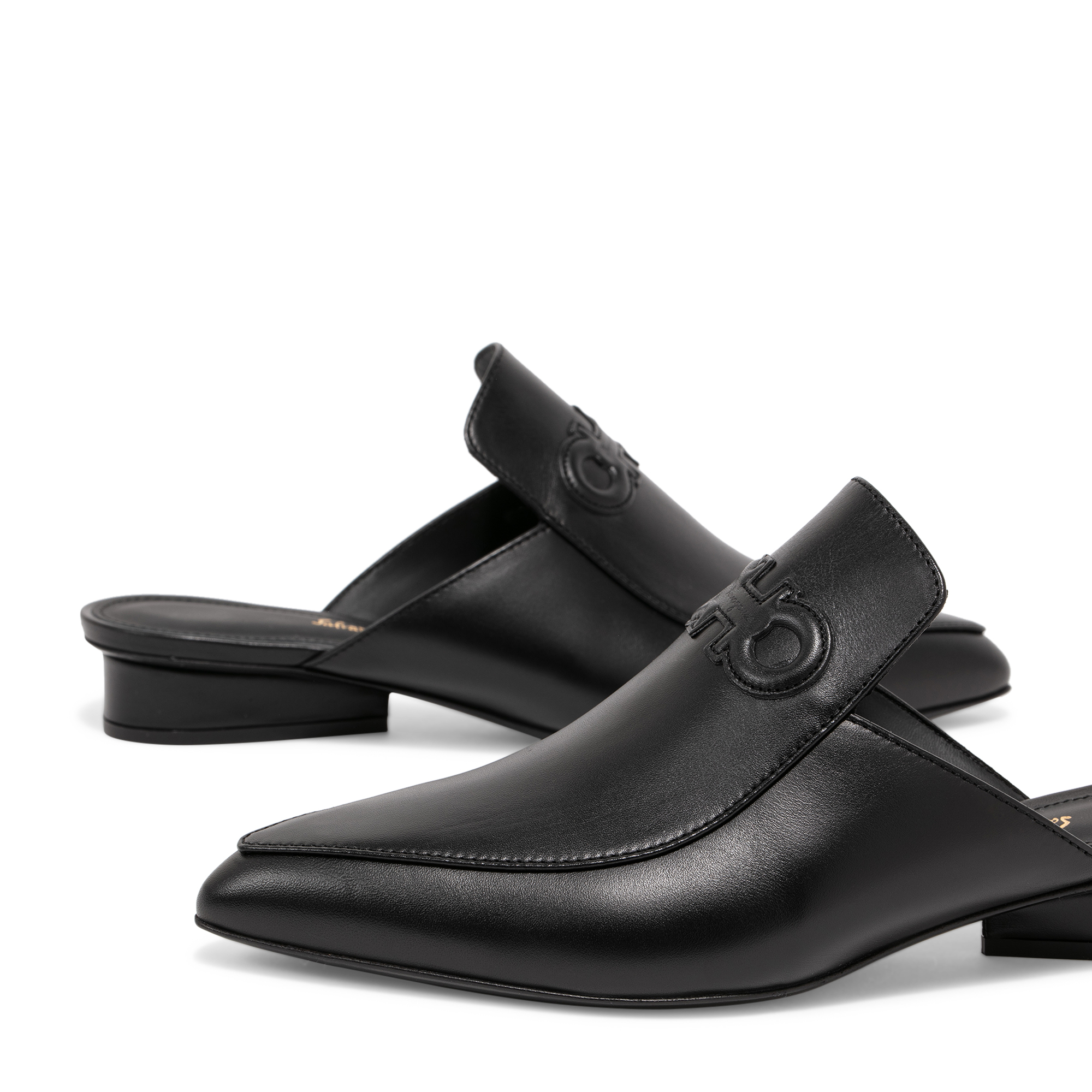 

Gancini mules, Black