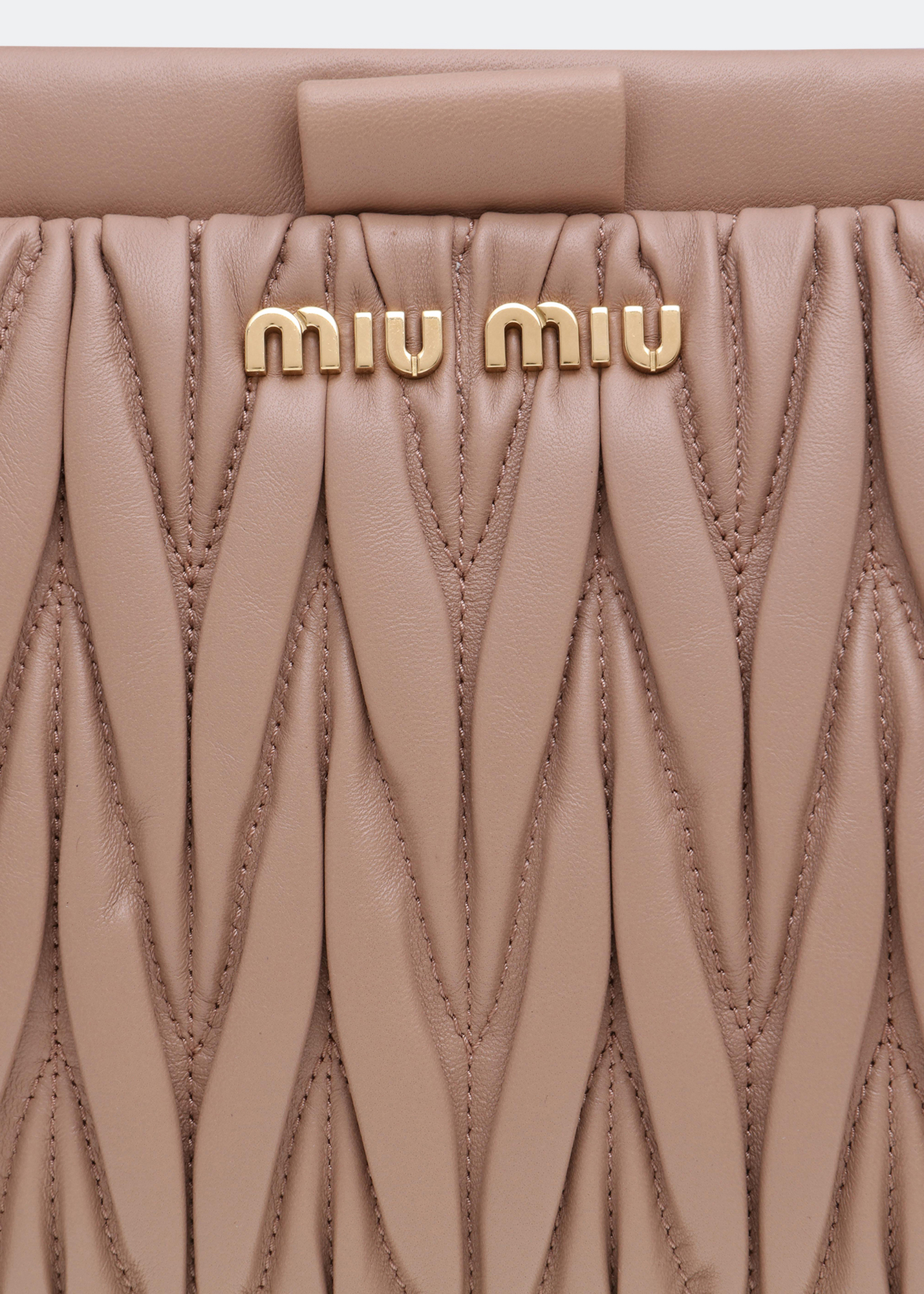 

Matelassé leather clutch, Beige