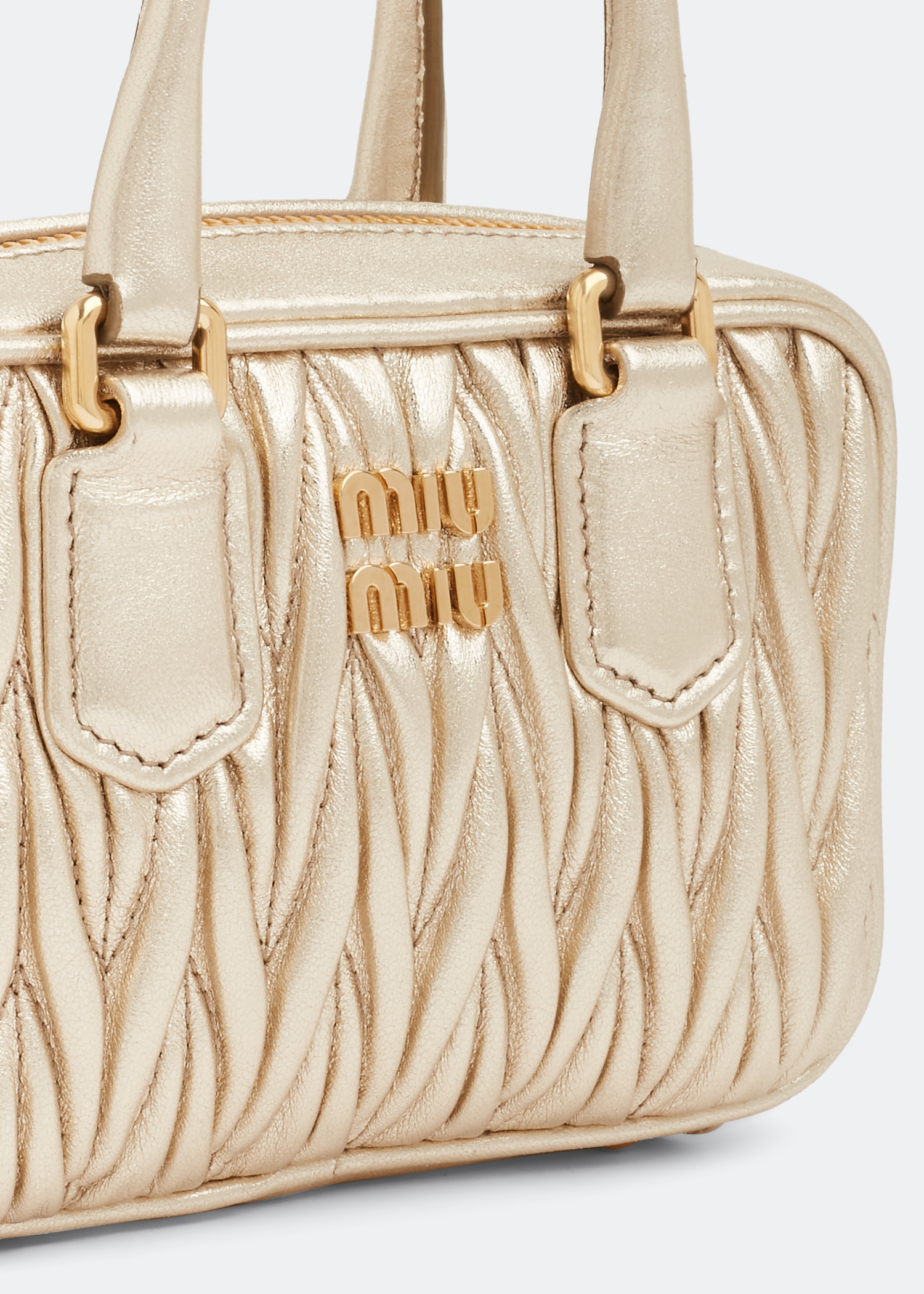 

Matelassé top handle mini bag, Gold