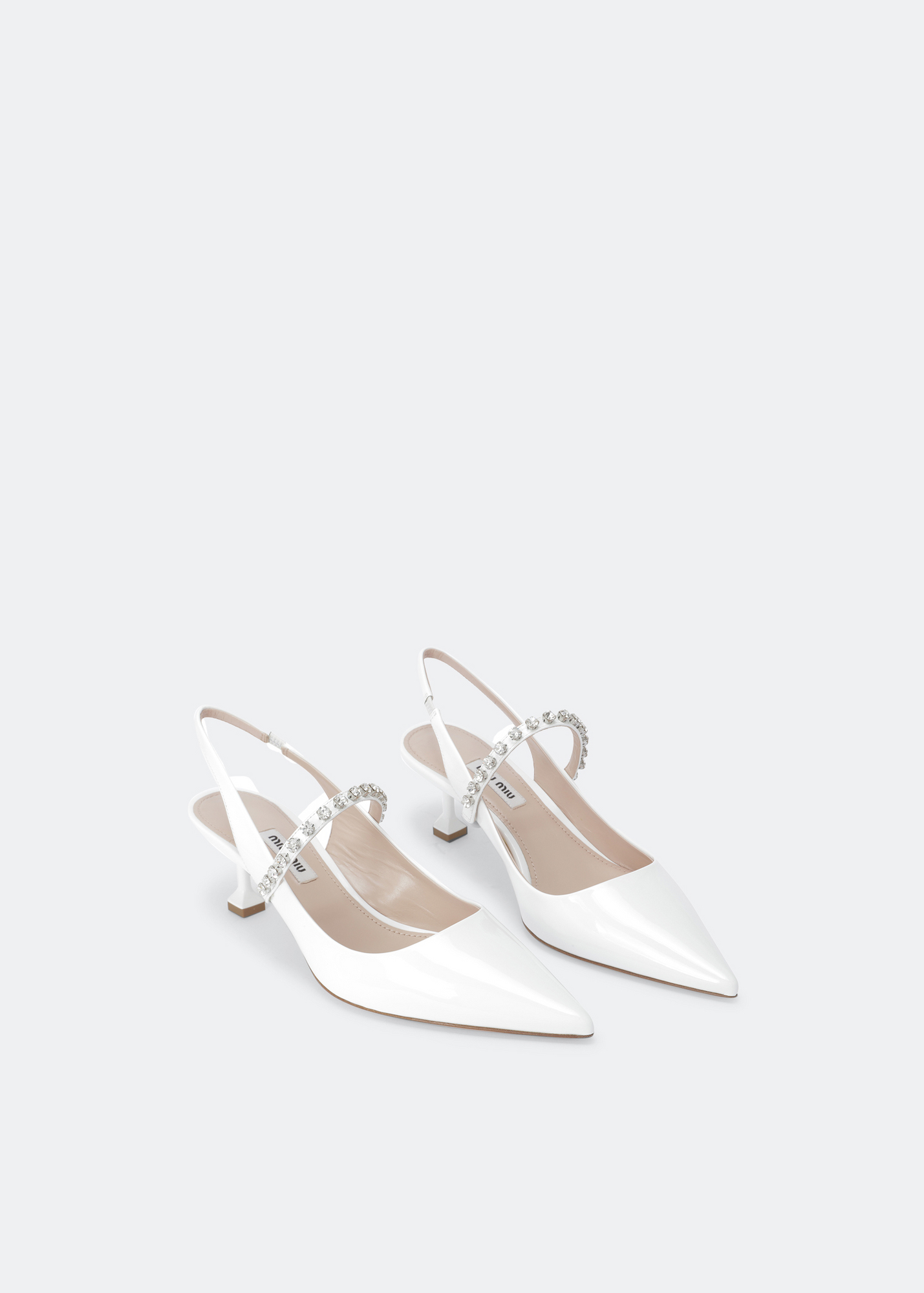 

Patent leather pumps, White