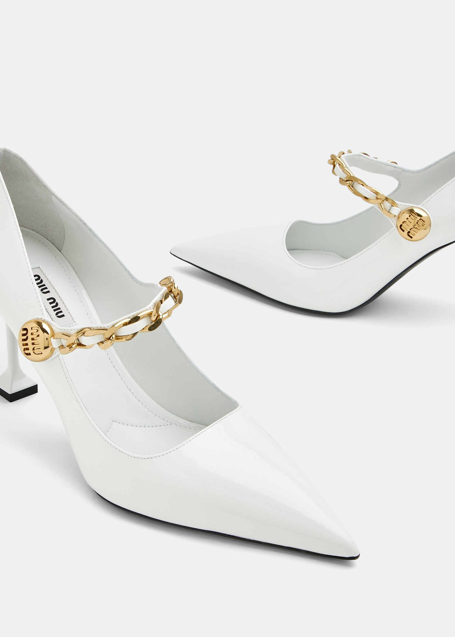 

Patent leather pumps, White