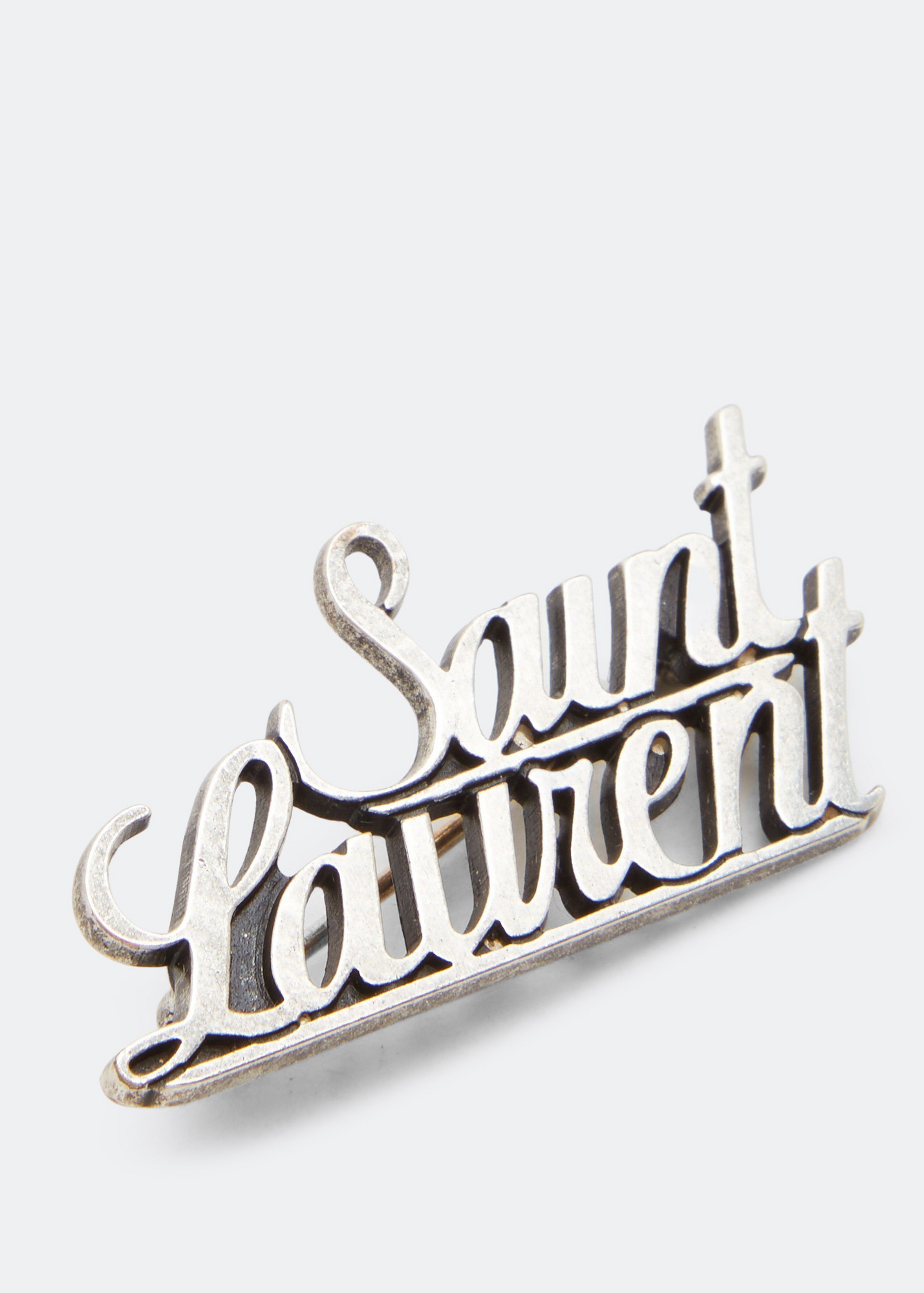 

Signature metal brooch, Silver