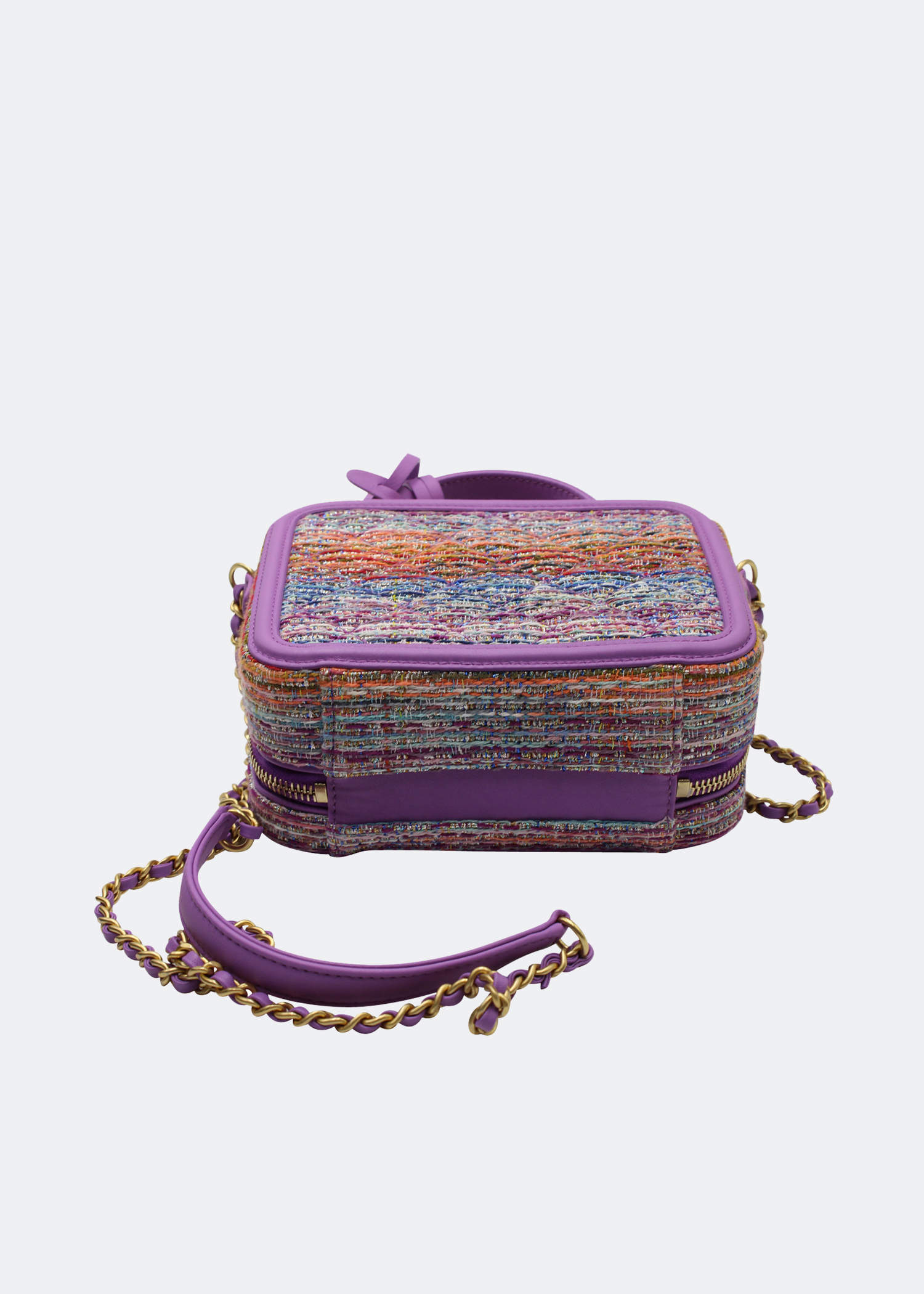 

Tweed quilted filigree vanity bag in purple leather