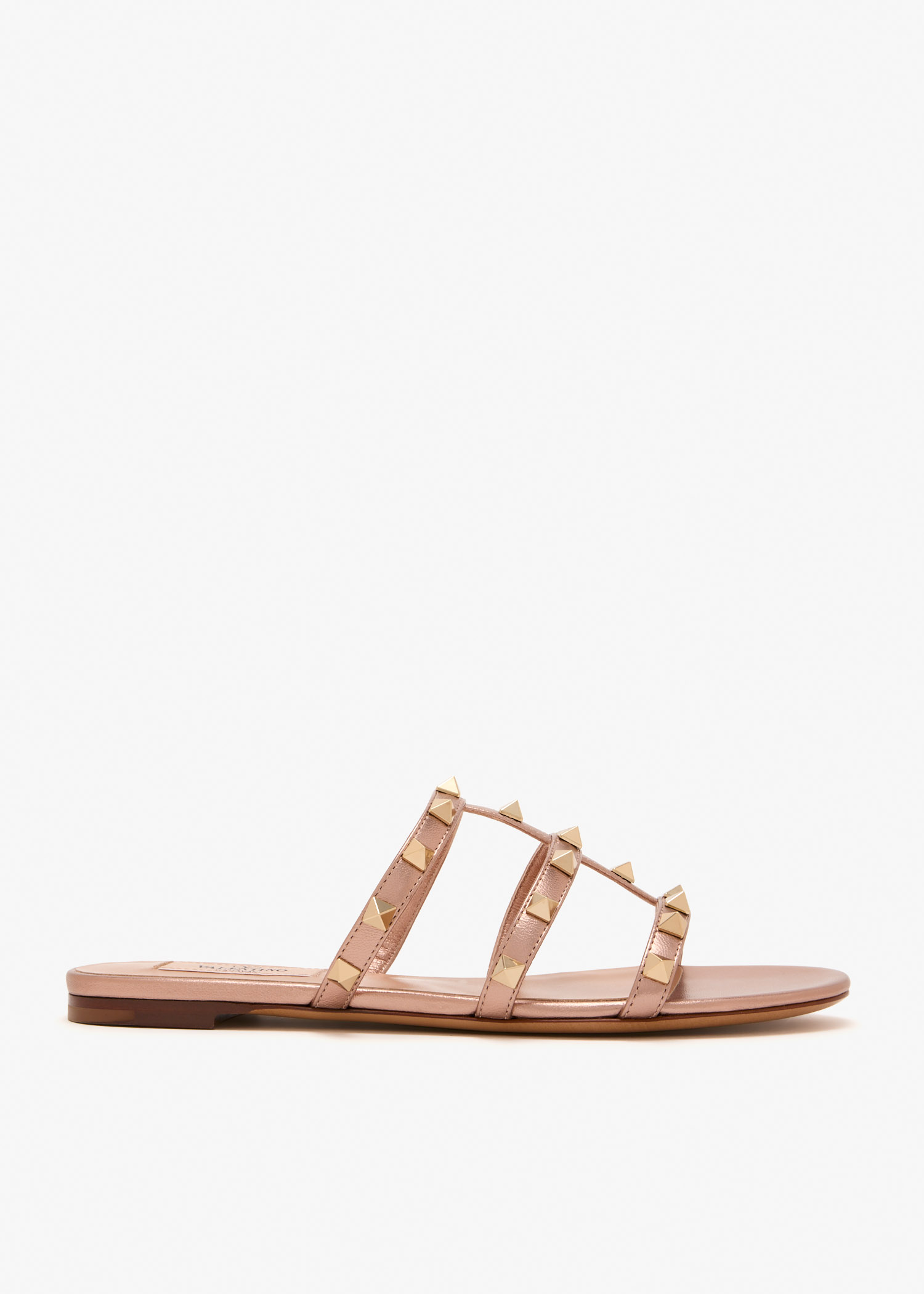 

Rockstud flat sandals, Rose gold