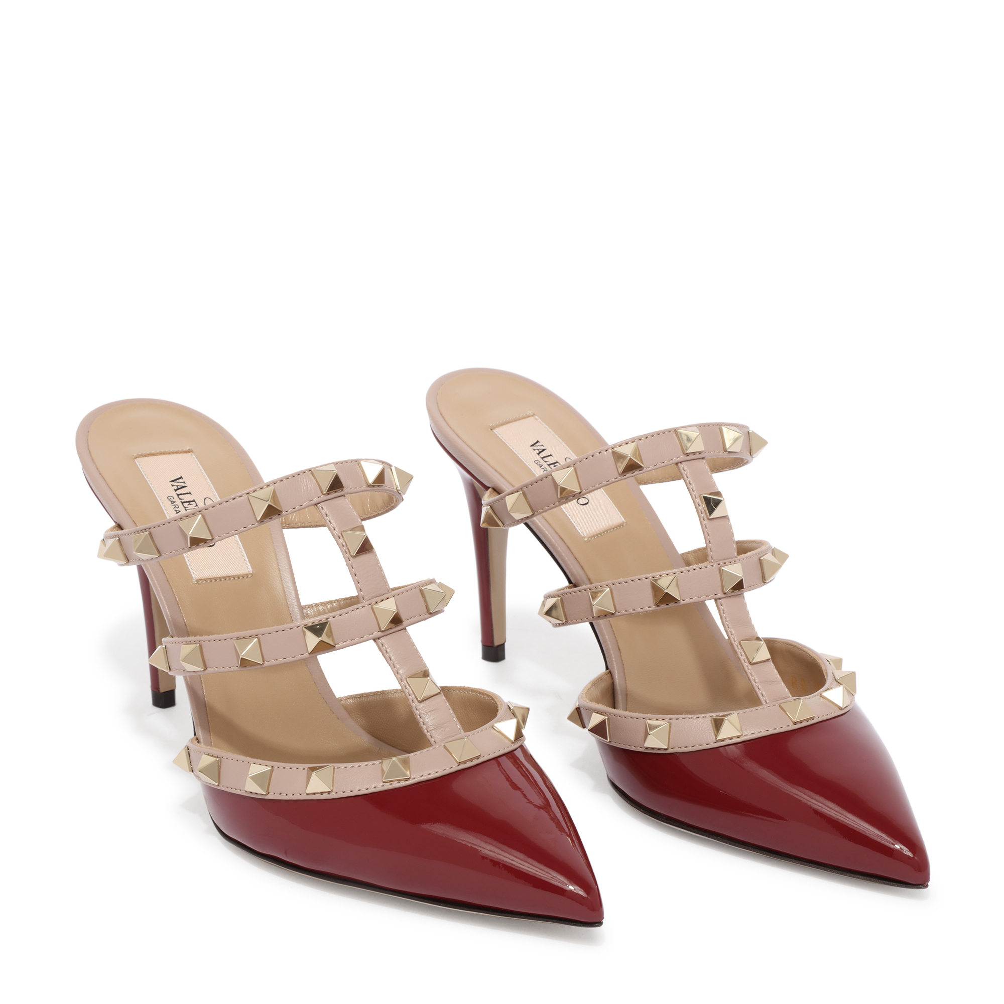 

Rockstud leather mules, Red